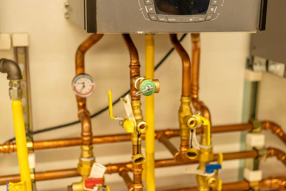 Licensed technician providing Water Heater Installation for a homeowner in Bloomfield