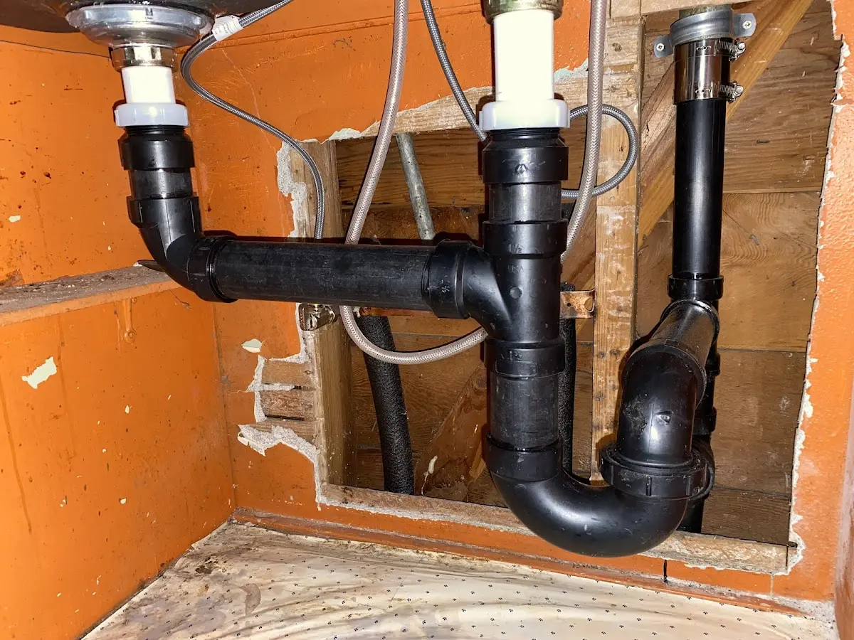 Professional Garbage Disposal Repair equipment and tools on the job in Bloomfield